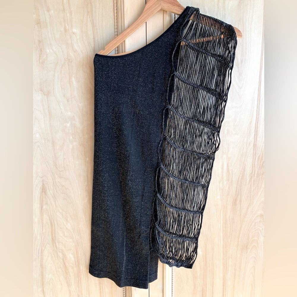 Worn one time! Totally fitted, off shoulder black with gold sparkles Bebe dress.